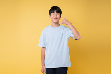 Smiling boy gesturing 