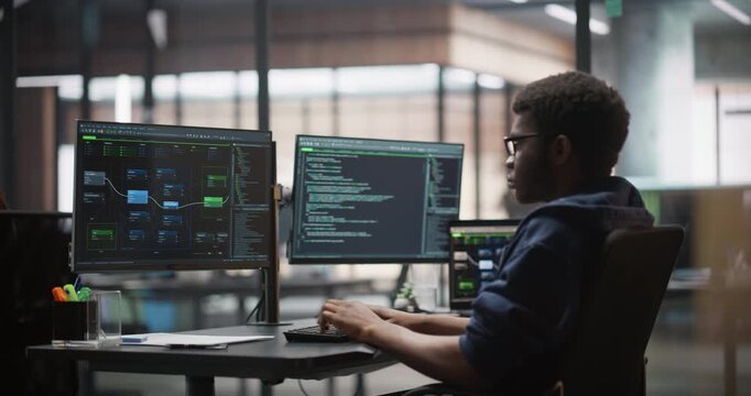 Male and Female Colleagues Walking in Hallway in Office, Talking and Using a Tablet Computer. Young Managers Discussing Work Assignments on a Software Development Project for an E-Commerce Company
