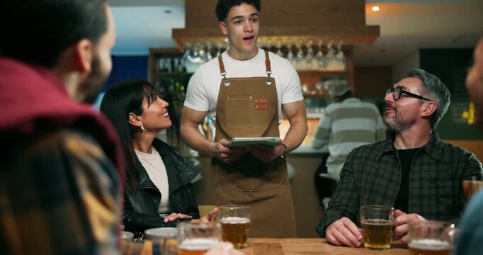 Waiter, tablet and beer with people at bar for menu order, hospitality and alcohol tab. Restaurant host, drink server and digital bill with friends at diner for bartender service and customer