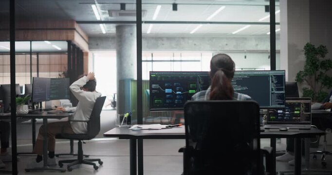 Office Workplace with Diverse Young People Working Behind Computers, Manager Walking with a Tablet. Male and Female Software Developers Working on Technological Projects, Writing Source Code