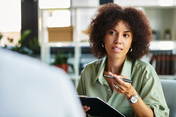 Young professionals engage in dynamic discussion during a job interview in a modern office space
