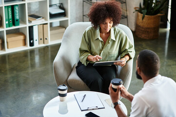 Engaging job interview between a candidate and an interviewer in a contemporary office setting