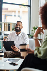 Engaging conversation during a job interview in a modern office setting