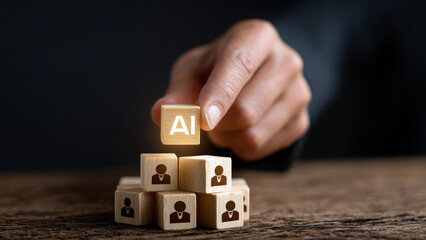 AI impact on jobs highlighted by wooden block placed above employee blocks showing technology influence and concern