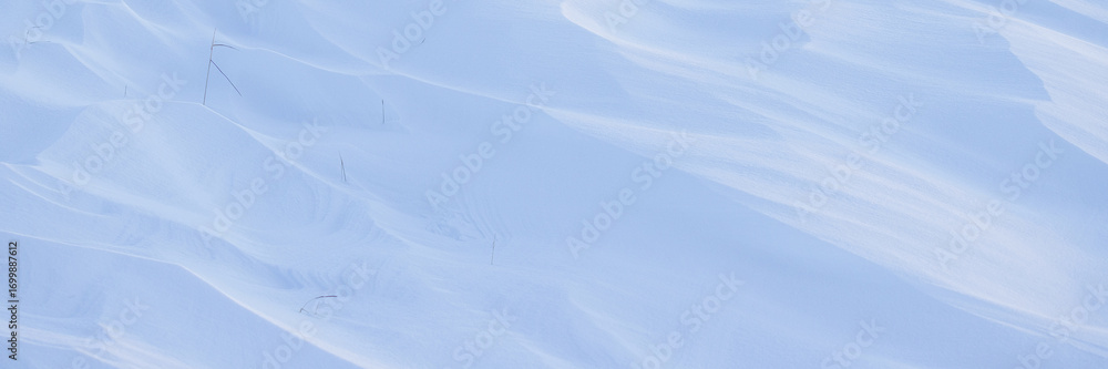 Sticker snow texture. wind sculpted patterns on snow surface. wind in the tundra and in the mountains on the