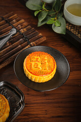 Delicious traditional Chinese mooncake with tea combo for Mid-Autumn festival afternoon treats celebration