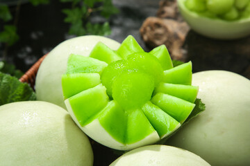Fresh Honeydew Melon Slices with Green Flesh - Healthy Summer Fruit Close-up © ThachThi