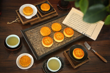 Traditional Chinese Mooncakes with Red Bean Lotus Seed Paste and Tea Mid-Autumn Festival Foods