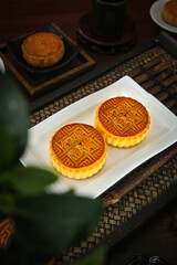 Traditional Chinese Mooncakes with Tea Set for Mid-Autumn Festival Celebration