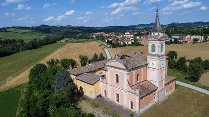 Fototapeta premium Serravalle Castle and the Church of San Apollinare, seen from a drone.