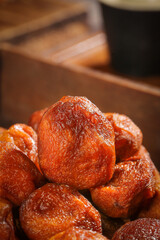 Xinjiang Dried Apricots - Traditional Air-Dried Preserved Fruit in Wooden Bowl