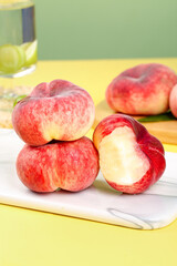 Fresh Red Shaanxi Flat Peaches Display on Marble Board Kitchen Setup