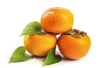 Fresh Persimmons with Green Leaves on White Background - Healthy Organic Fruit
