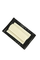 Fresh White Tofu Slices on Black Ridged Plate Isolated on White Background