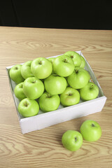 Fresh Green Apples from Shaanxi China in Box on Wooden Table - Sweet Crisp Fruit Harvest