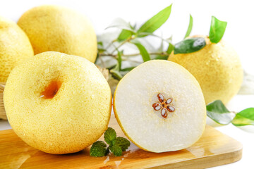 Fresh White Pears with Green Leaves on Wooden Board - Healthy Organic Fruit Photography