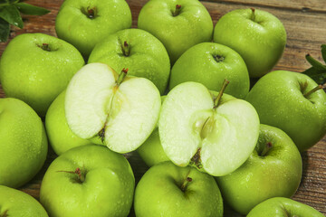 Fresh Green Apples with Water Droplets on Wooden Background - Healthy Organic Fruit