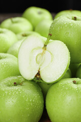 Fresh Green Apples with Water Drops - Crisp Sweet Fruit Sliced Half Showing Core