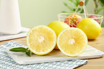 Fresh Golden Grapefruit Halves on Cutting Board - Healthy Citrus Fruit Kitchen Scene