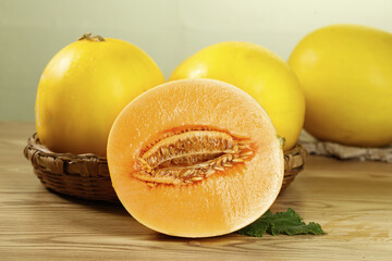 Fresh Shaanxi Honeydew Melons in Basket - Yellow Fruit Crop Display