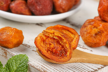 Dried Xinjiang Apricots on Wooden Spoon - Natural Organic Fruit Snack Food Photography