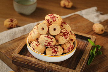 Fresh Peeled Pitted Xinjiang Jujube Dates in Bowl on Wooden Tray Traditional Chinese Dried Fruit