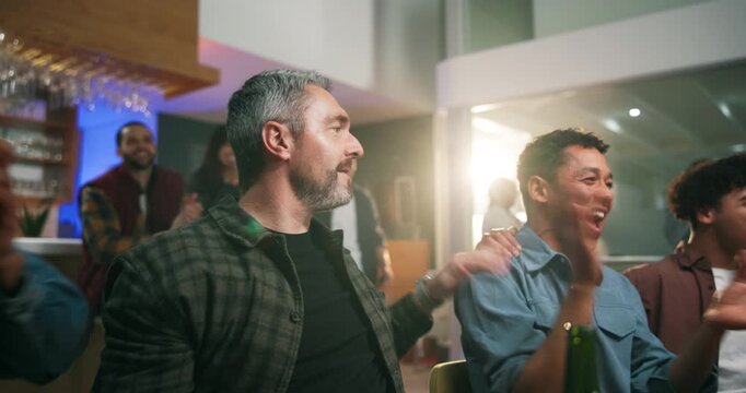 Winner, watching tv and celebration with man at pub for streaming game, sports score and goal. Team support, fans cheering and competition with people in bar for live broadcast and match results