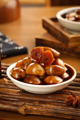 Pickled Garlic Cloves Traditional Side Dish in White Bowl on Rustic Wooden Table