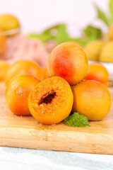 Fresh Ripe Apricots on Wooden Board with Shallow Depth of Field - Healthy Summer Fruit Photography