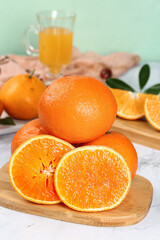 Fresh Orange Citrus Fruits on Wooden Board with Glass of Juice - Healthy Kitchen Food Photography