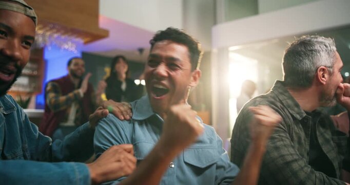 Victory, watching and people in home with bar, goal or celebration in soccer tournament. Support, sport and football fans in house with drink station, score lead and joint excitement in viewing party