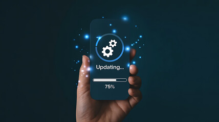 Hand holding a transparent smartphone displaying a loading progress bar and gears icon with digital data flowing