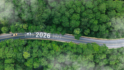 Aerial top view road in forest with car to start the new year 2026 Goal plan action, Business...