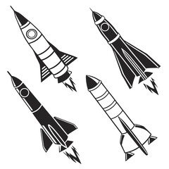 A collection of four stylized black and white rocket ship illustrations in various orientations suggesting a journey into space with fiery exhaust