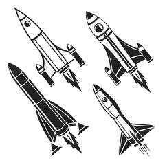 Four stylized black and white rocket ship illustrations in different designs and orientations depicting space travel and exploration with fiery exhaust trails
