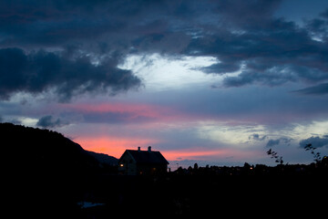 house in silhouette and sunset