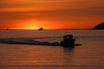 boats in the sunset