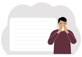 A man covers his nose with his hands with a handkerchief. The concept of a sick person, sneezing, seasonal allergies, bad smell.