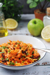 A bowl with traditional Polish carrot salad  © nastyakamysheva