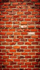 Obraz premium Red brick wall in rustic style with textured surface 