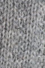 Close-Up of broken Ribbing Knitted Fabric in Heathered Gray Yarn
