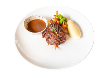 Gourmet Steak Delight: A close-up view captures a mouthwatering gourmet steak, expertly plated...