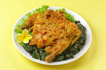 Ayam Betutu is a Balinese specialty. It's made from whole chicken or duck cooked with Balinese spices.