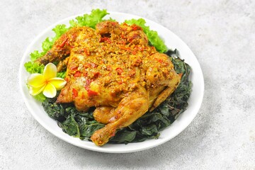 Ayam Betutu is a Balinese specialty. It's made from whole chicken or duck cooked with Balinese spices.