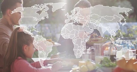 Hospitality showing man carrying potatoes initiating family sharing meal on patio with map overlay - Powered by Adobe