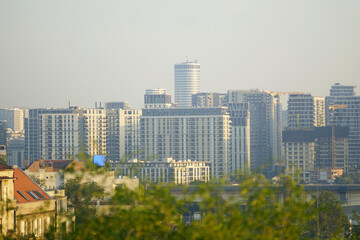 Modern city skyline with residential buildings and skyscrapers. View of the Belgrade Waterfront area. Concept of housing, real estate, urban architecture, contemporary lifestyle in metropolitan