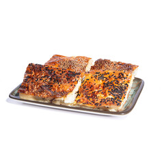 Tray pastry with cheese. Tray pastry on a white background. Sesame pastry.