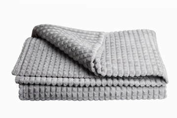 
Cozy grey blanket neatly folded for warmth and comfort isolated on white background