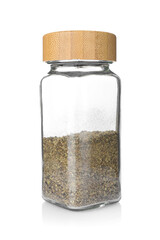 Ground black pepper in glass jar isolated on white. Aromatic spice