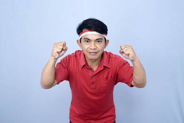 young man showing optimistic pose